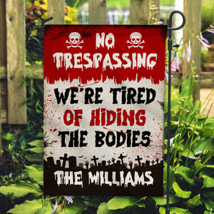 No Trespassing We're Tired Of Hiding The Bodies - Personalized Family Name Flag - Halloween Gift